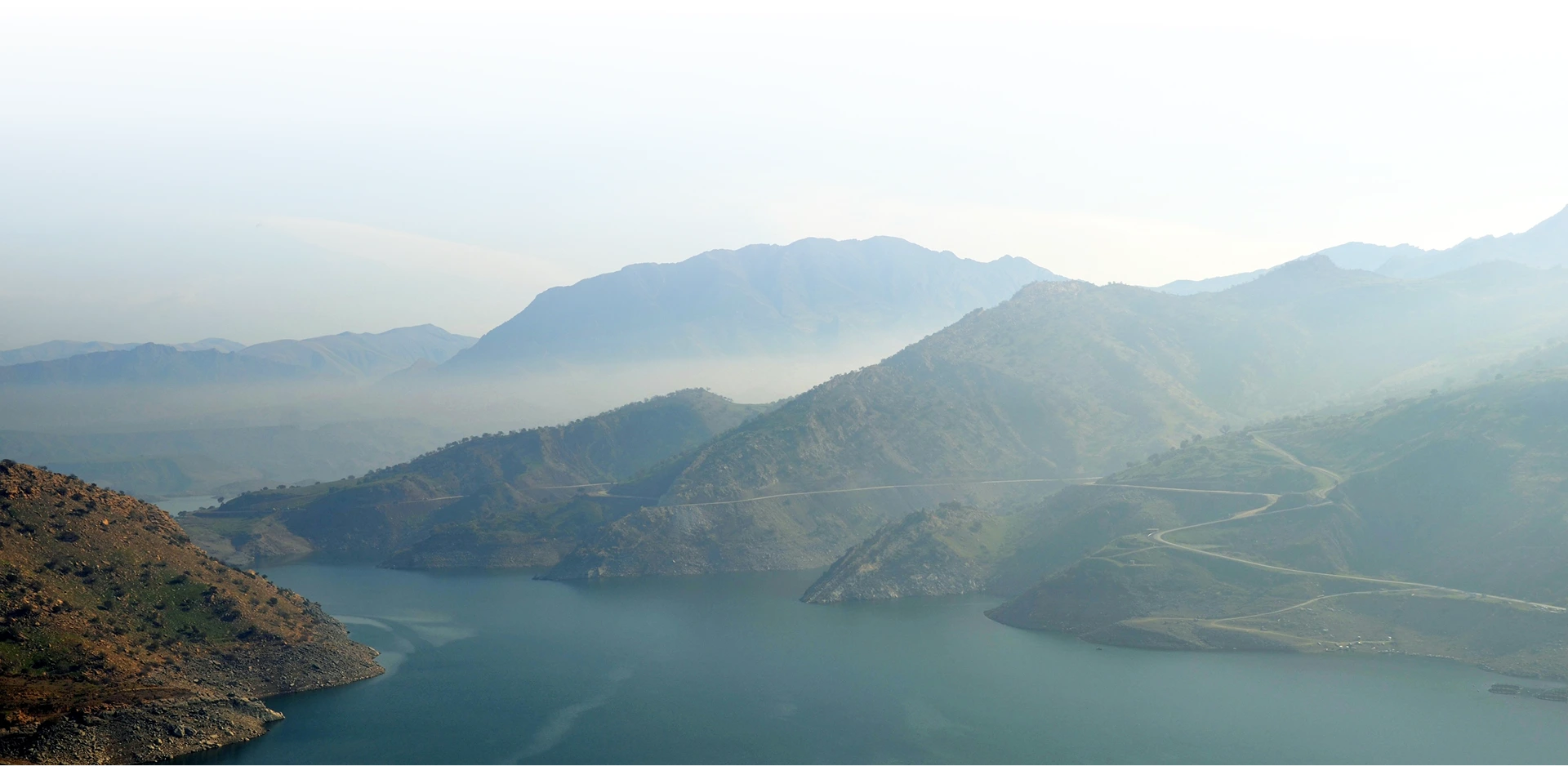 morning light over misty mountains